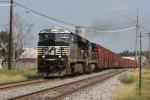 Southbound NS 7637 (EMD SD60) coming through the city